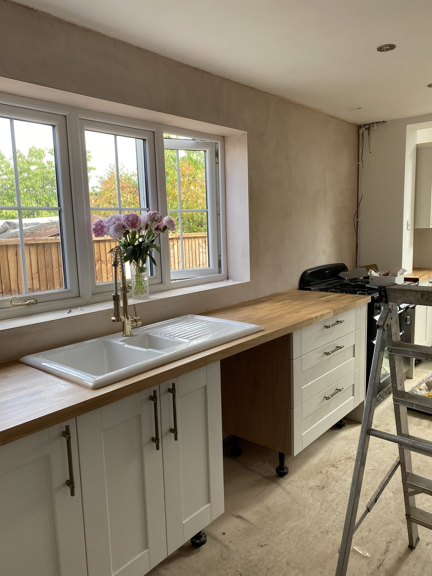 Shaker units and oak worktops going in