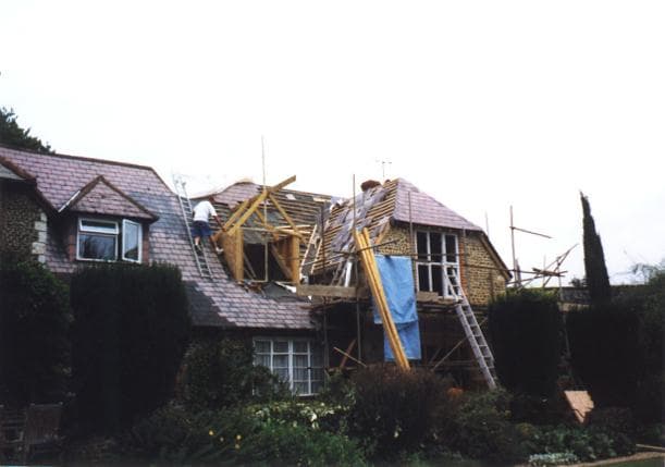 New roof framing to a flint cottage